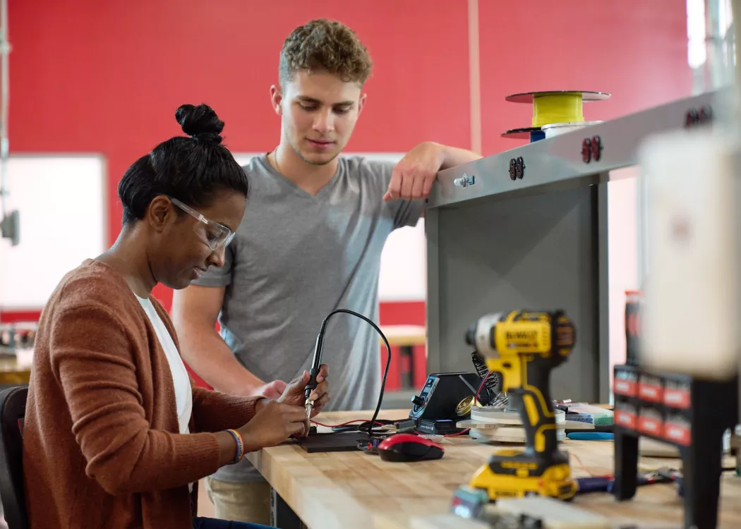 Students looking at an engineering project.