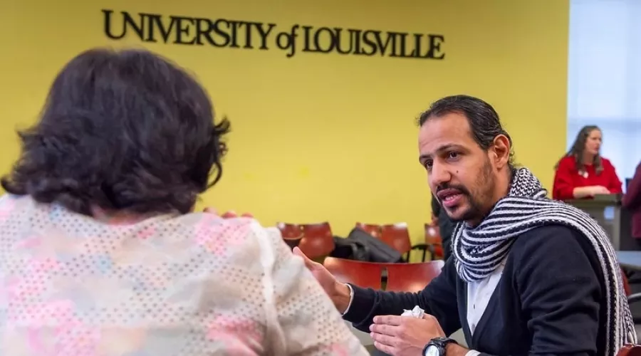 Graduate student working with a mentor.